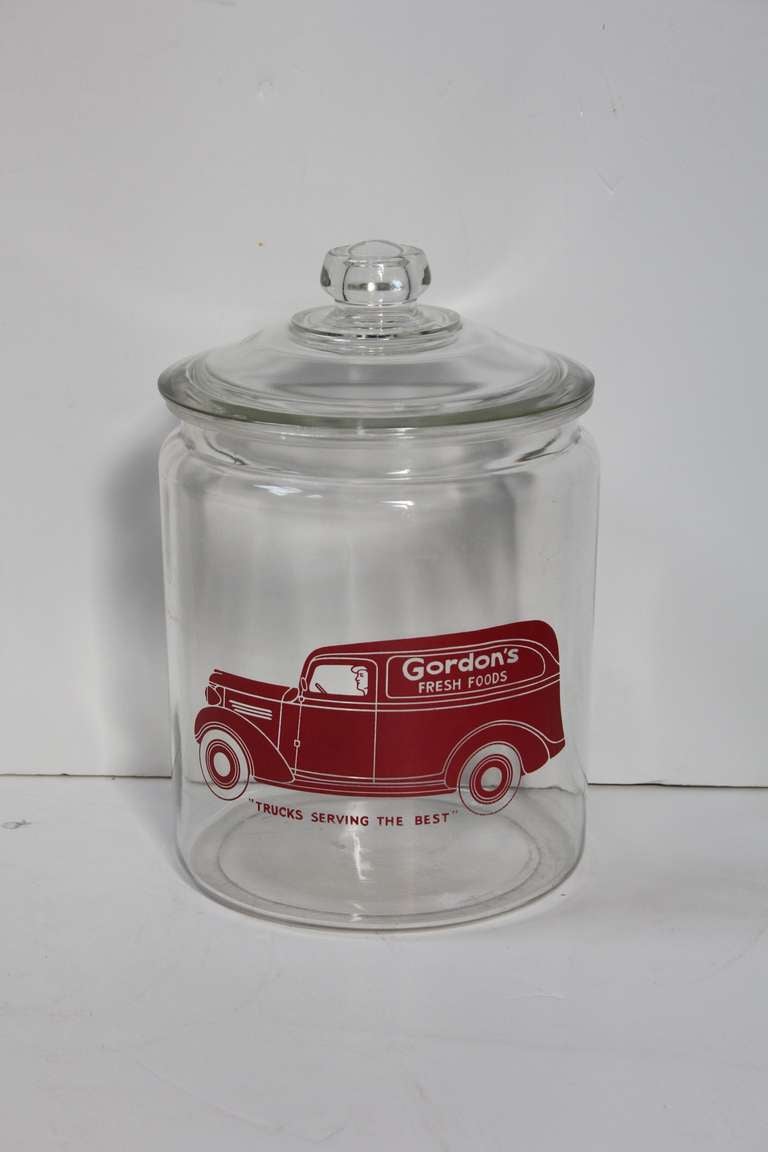 Art Deco glass cookie jar with advertising sign for Gordon's Fresh Foods.