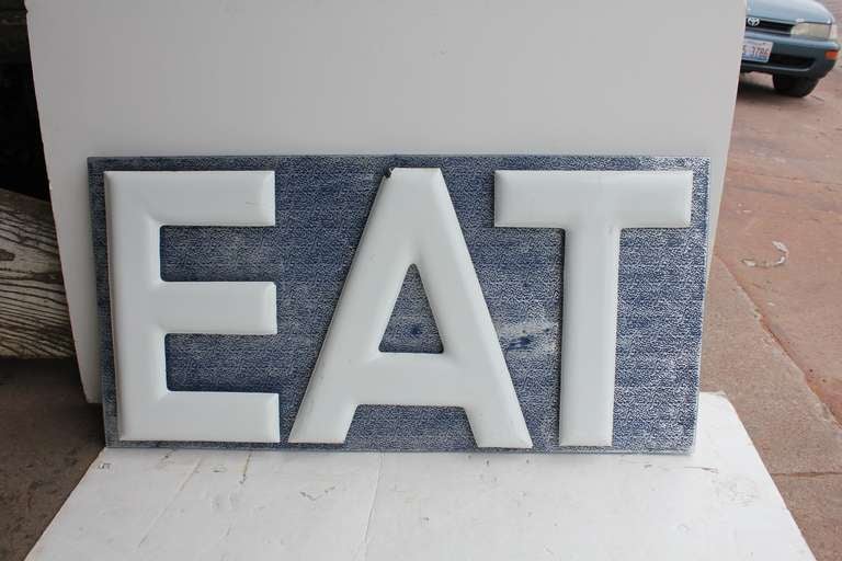 Great original American 1930's porcelain three letters sign EAT. Letters are attached to metal board.