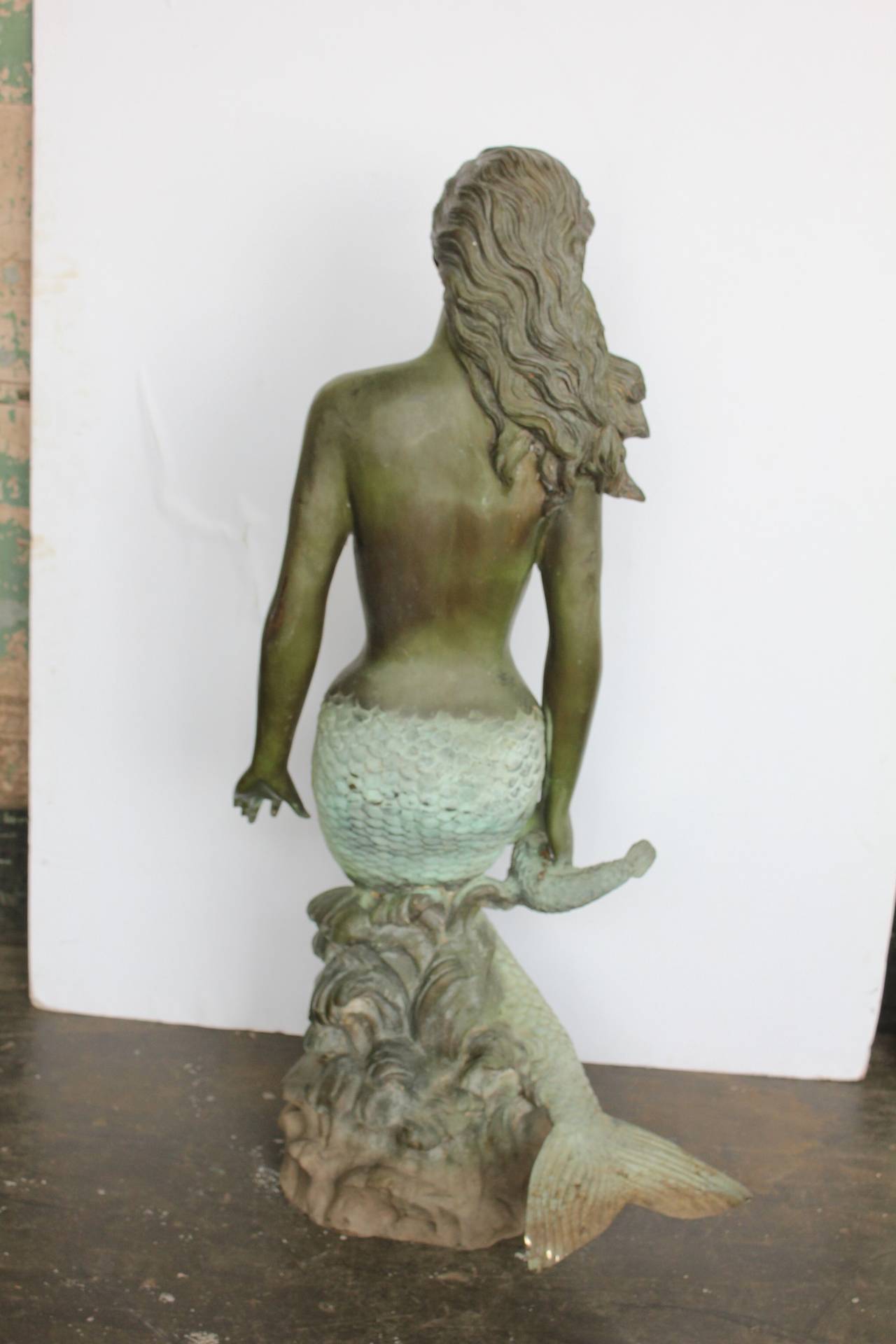 bronze mermaid figurine