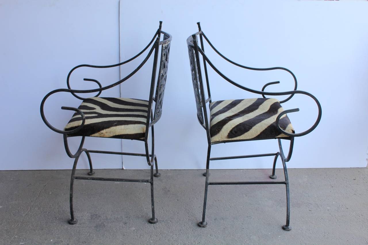 Midcentury Wrought Iron and Cowhide Sunburst Armchairs by Arthur Umanoff In Good Condition In Chicago, IL