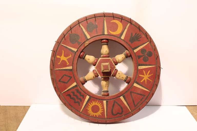 Roue de jeu antique à double face d'art populaire