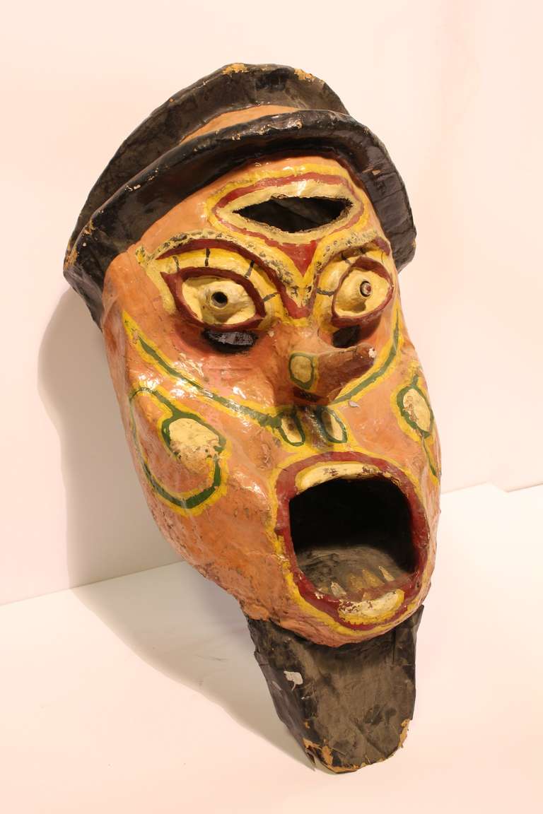 Early 1900's hand painted paper mache carnival head.