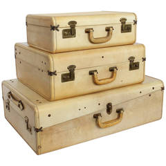 Collection of Three Antique Vellum Suitcases