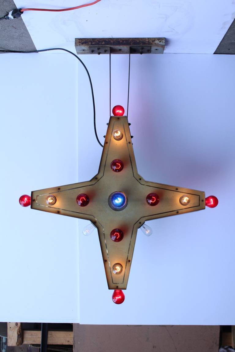 1950s car dealer double sided light up star sign. The lights flash on and off. In working condition.