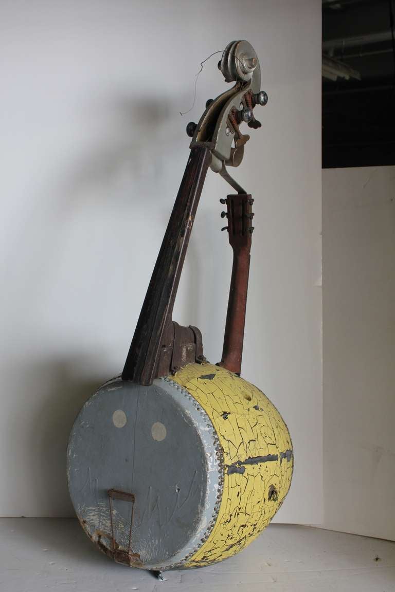 Unique large Folk Art instrument prop made from a drum, cello neck and guitar neck.