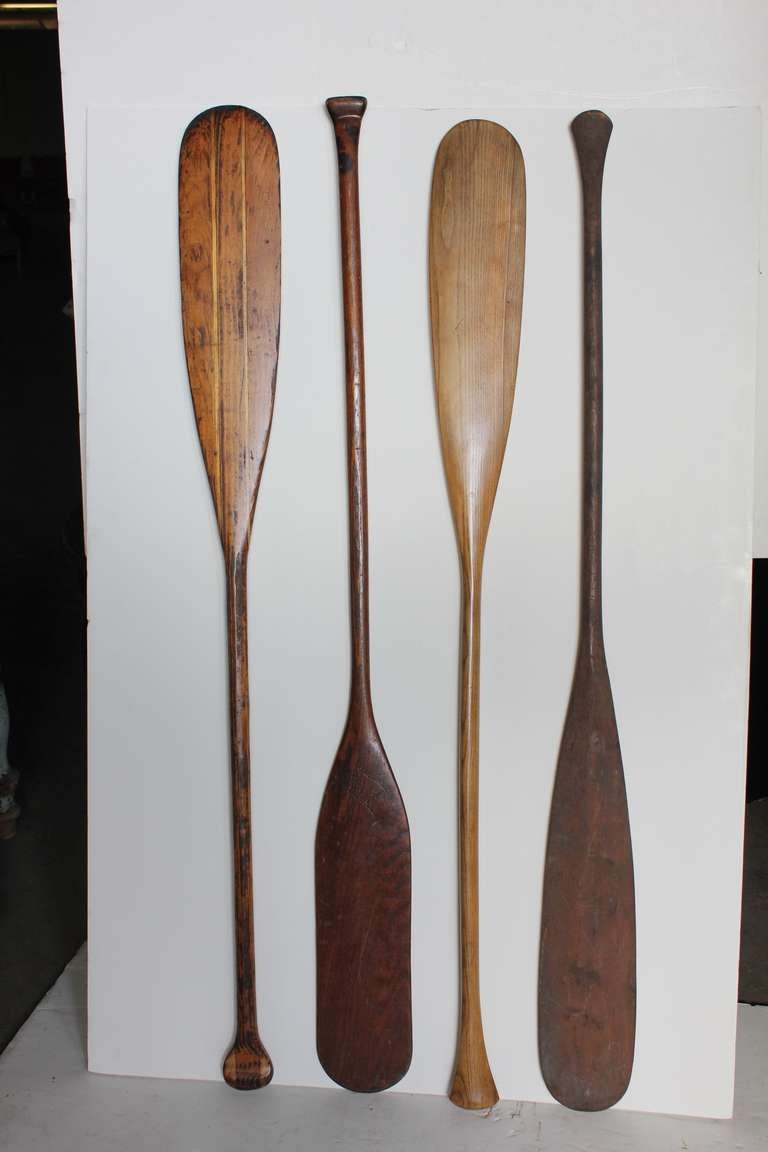 Antique wooden oars collection.