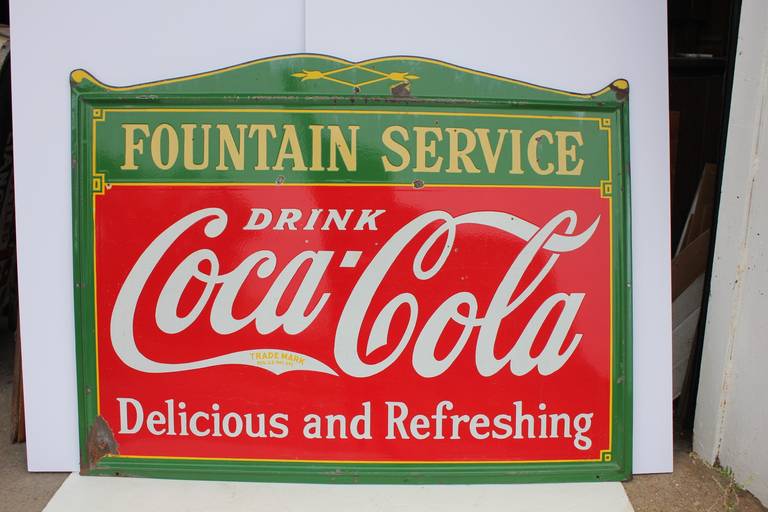 1940s porcelain advertising sign for Coca Cola.