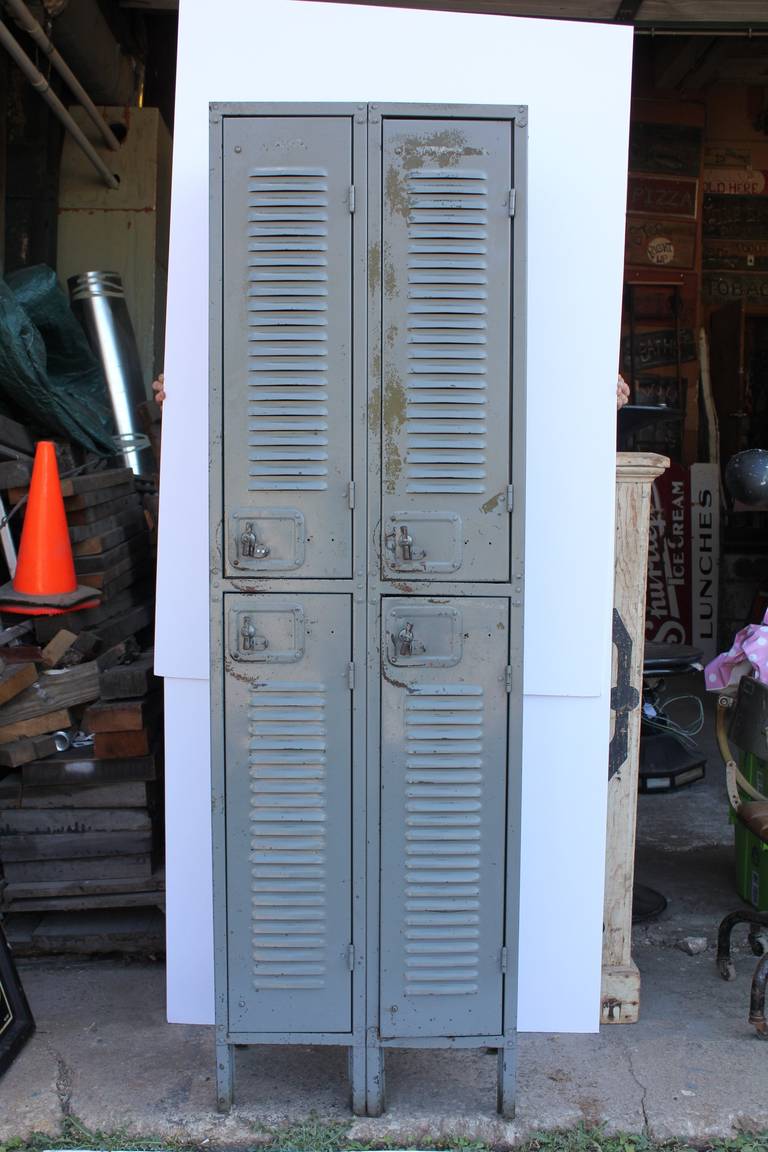 Antique industrial metal lockers. We have two available. Original paint.