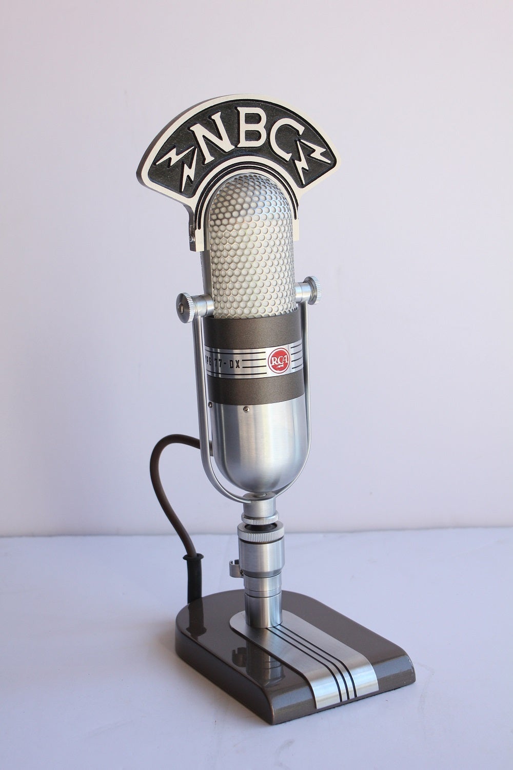 1950's Original RCA Microphone. NBC sign is new. The Art Deco style stand is new also.