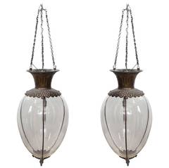Pair of Large Antique Drugstore Glass and Bronze Show Globes Chandeliers