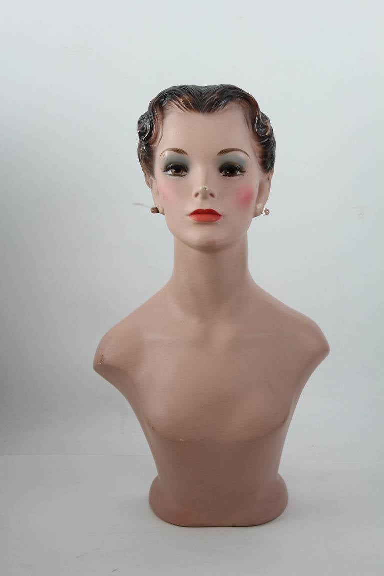 1930s hand-painted woman's bust mannequin.