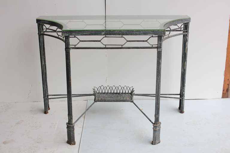 Elegant modern metal base Demilune/console table with glass top. We have two tables available. Listed price is for one table.