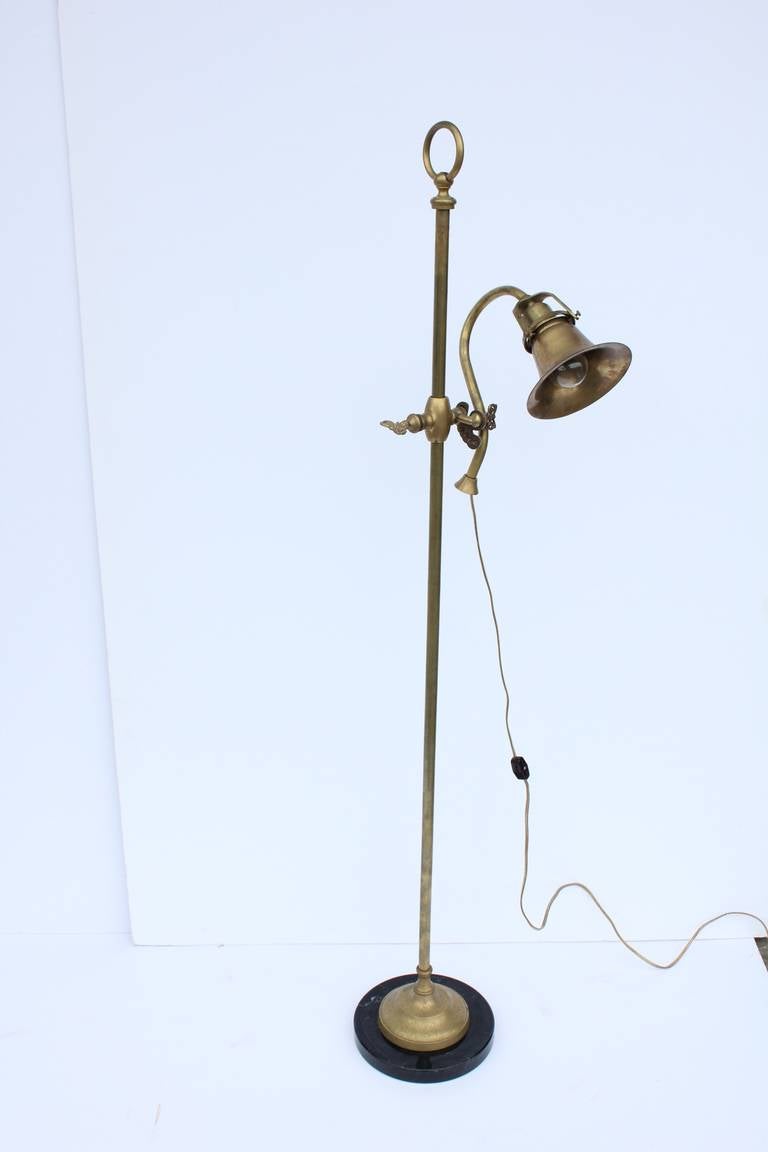 Antique library adjustable brass floor lamp with marble base.