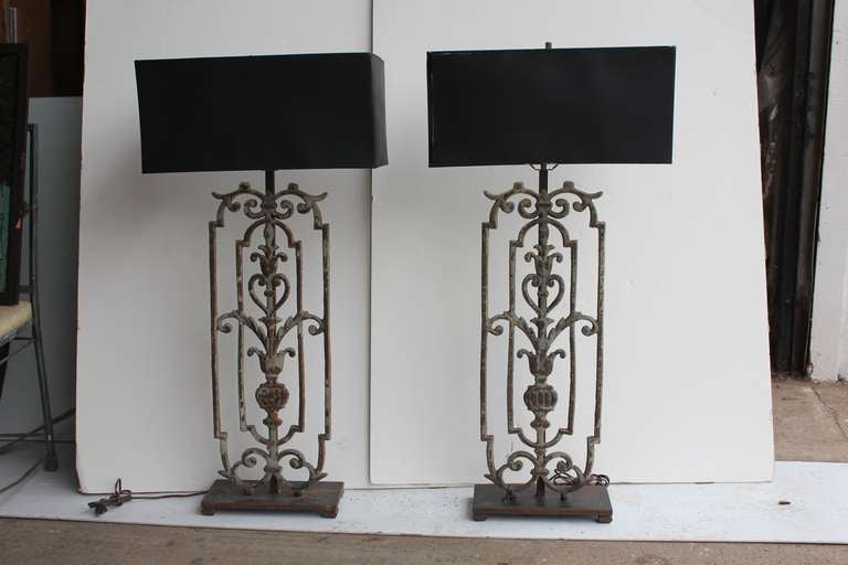 Great set of two tall wrought iron table lamps. Newly rewired.Lamps were made in 20 century of 1900's wrought iron pieces.