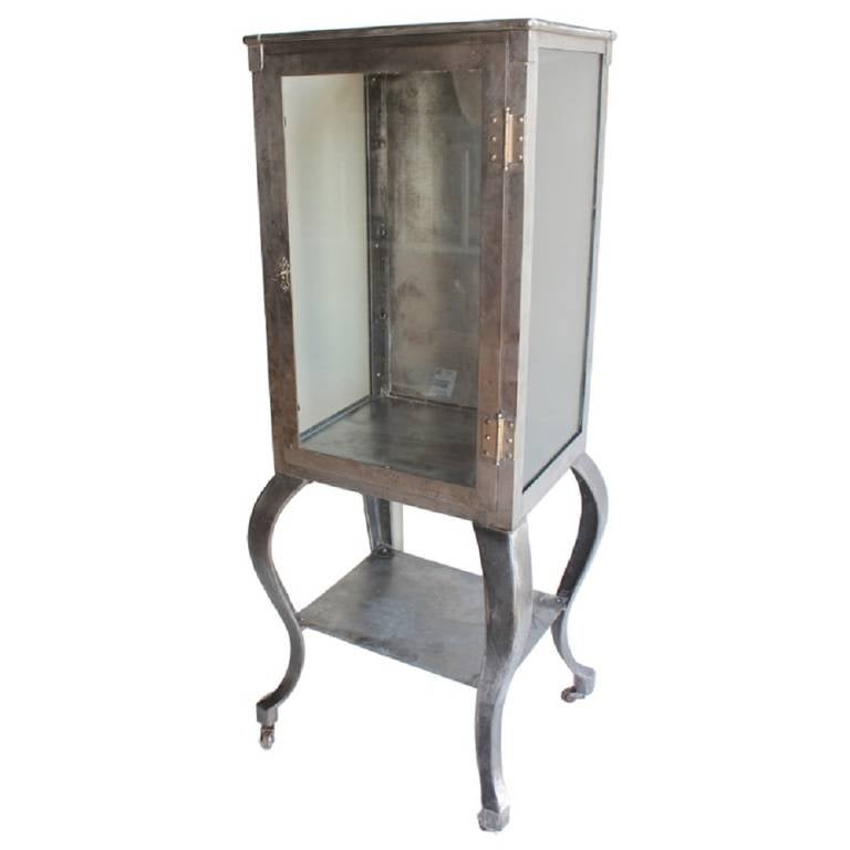 1900s medical metal cabinet with glass shelves. Newly refinished.