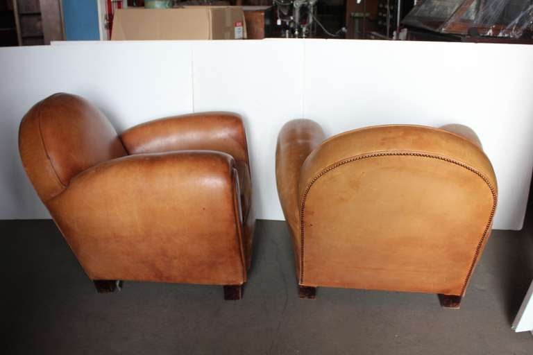 Great set of two 1930's French leather club chairs.
Original distressed leather upholstery.