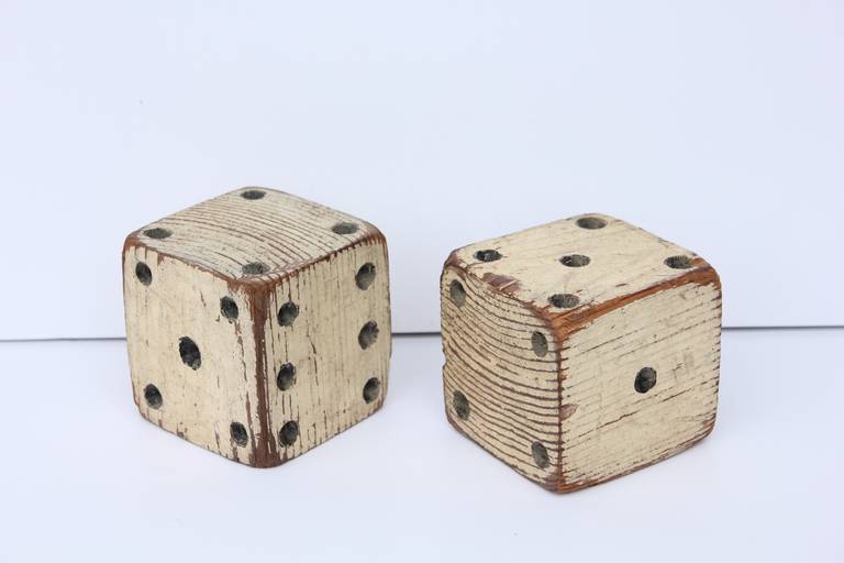 Antique hand painted and hand carved carnival dice.