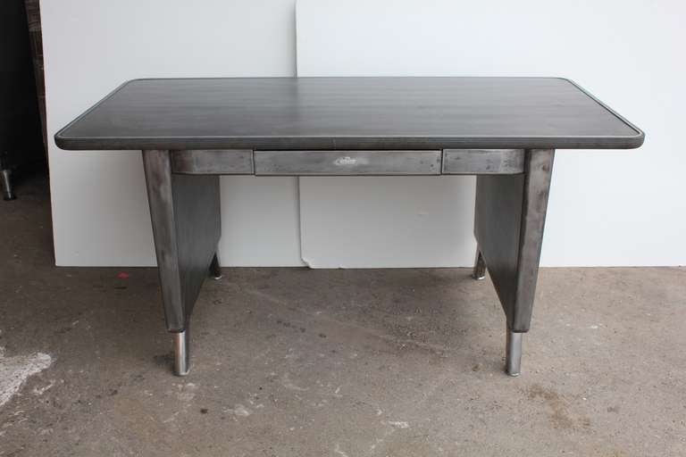 1950's American original newly refinished office tanker metal desk with arch legs. We have another desk like this but much larger. Dimensions of other desk: H 29.75