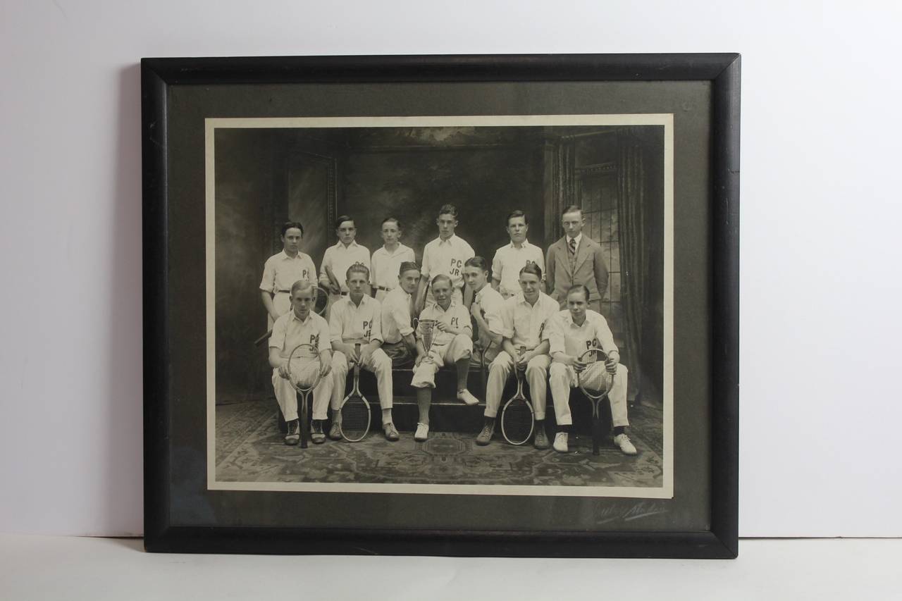 Antique photo of the junior tennis players framed in original wooden frame.