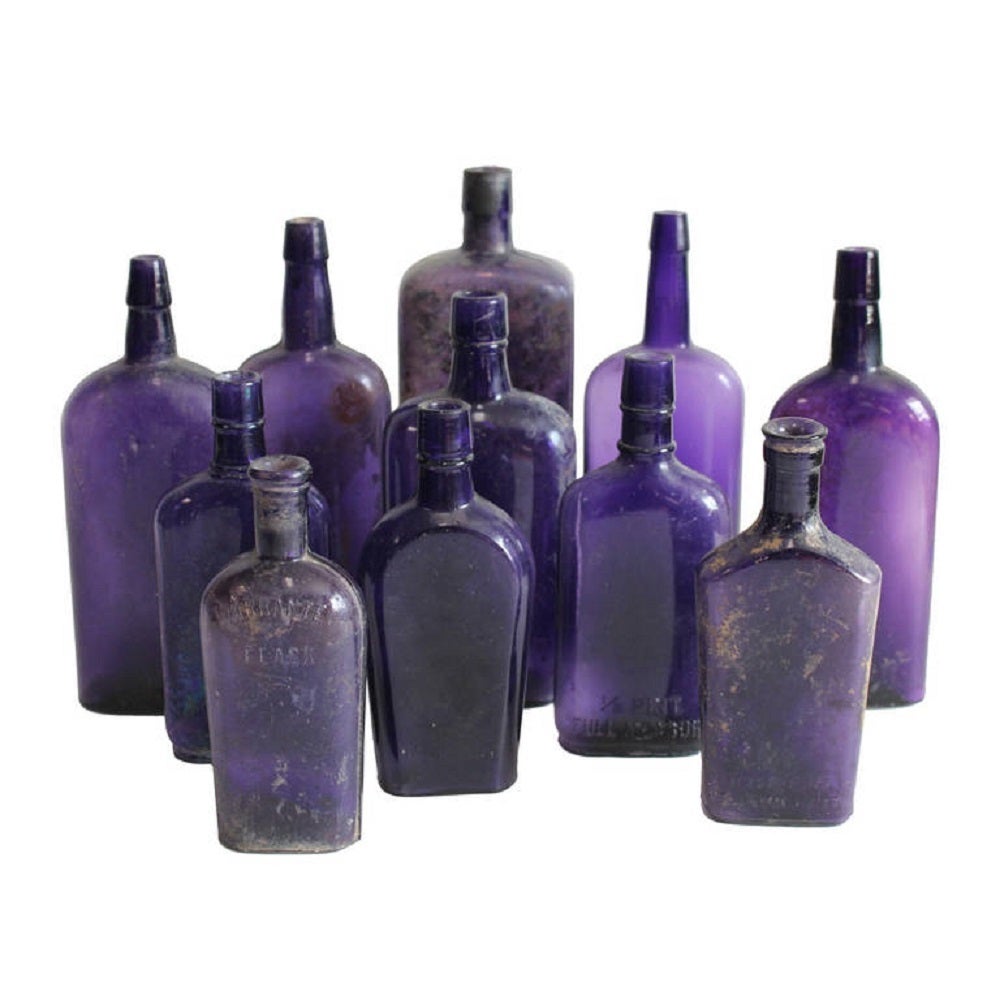 1800's American whiskey purple glass bottles.