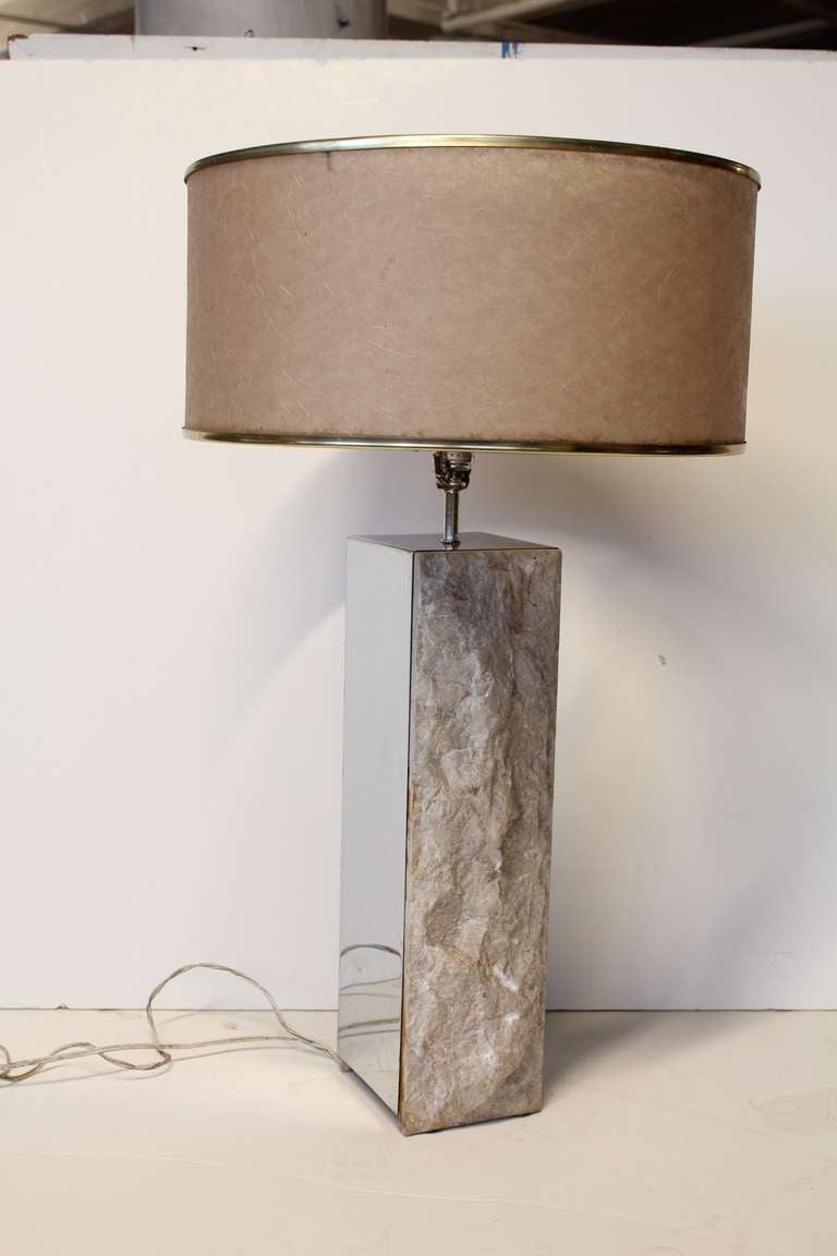 Very stylish mid century chrome & stone table lamp with original shade. It does work.