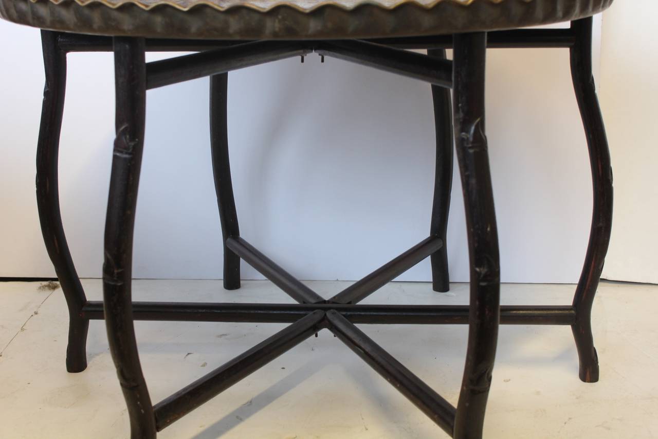 1920s large brass tray table with folding wooden stand.