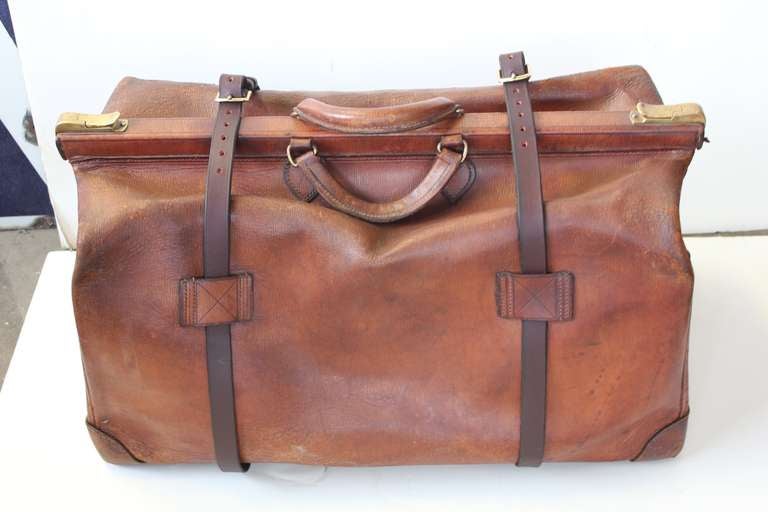 Antique English leather weekend bag. Some wear on the corners.Very clean inside.
