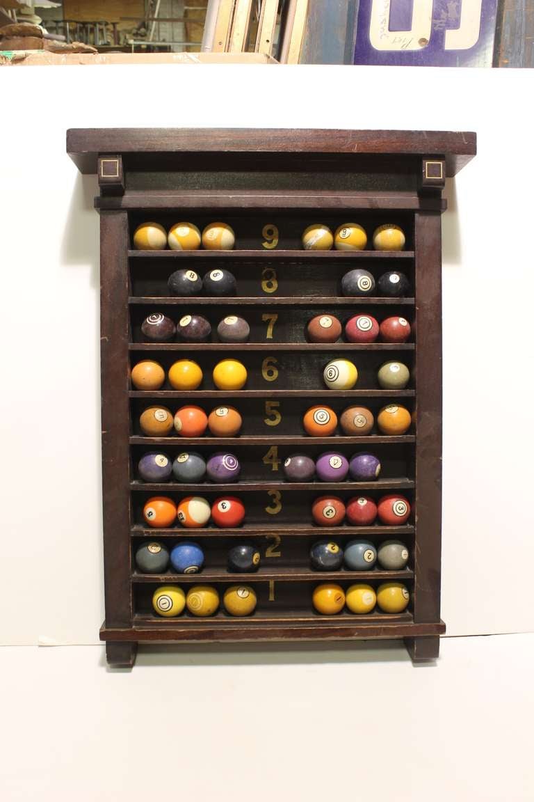 Antique wood Billiard Ball rack with hand painted numbers. Attached Billiard balls included.