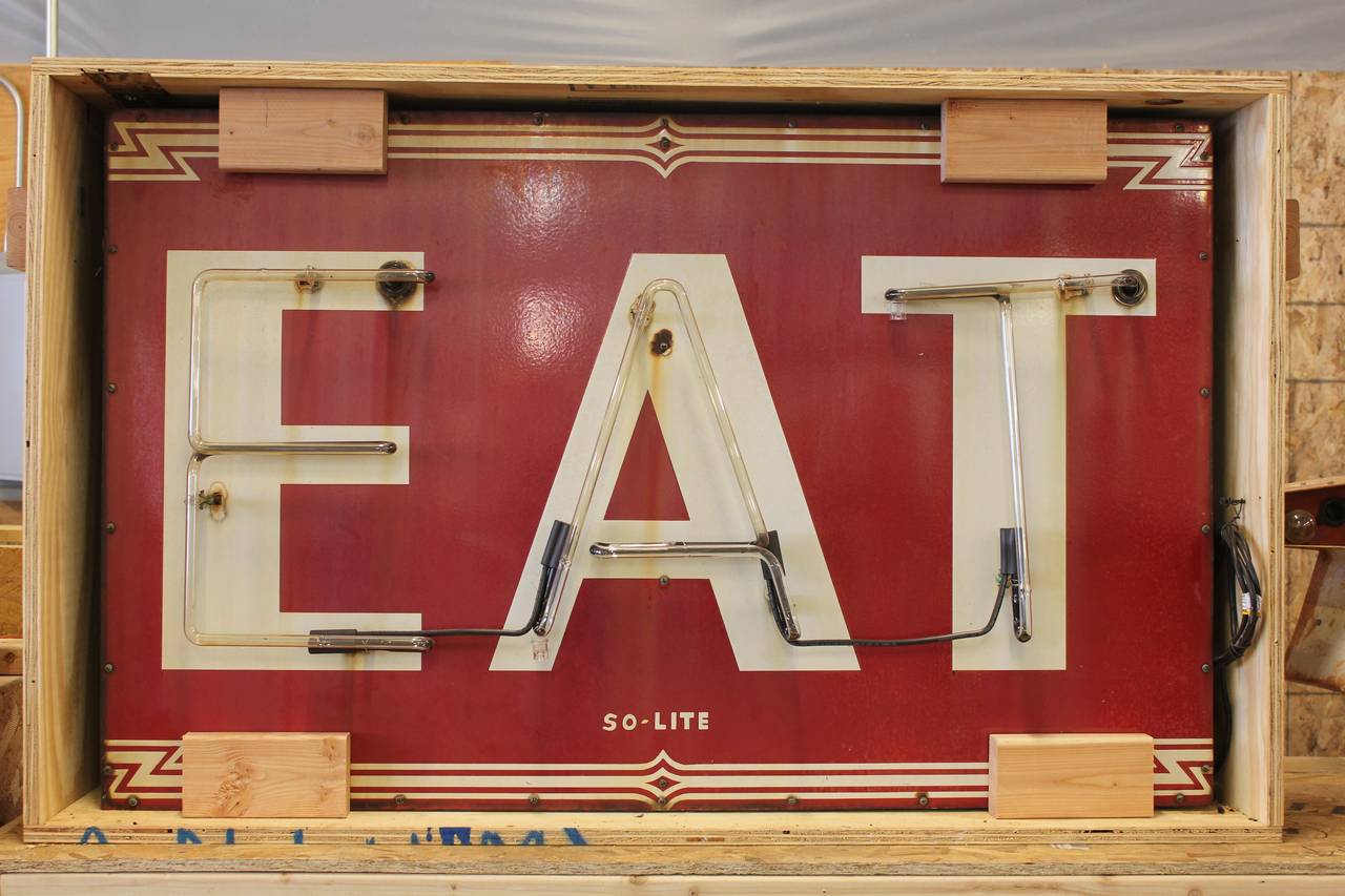 Art Deco enamel EAT sign with attached neon. Newly rewired. In working condition.