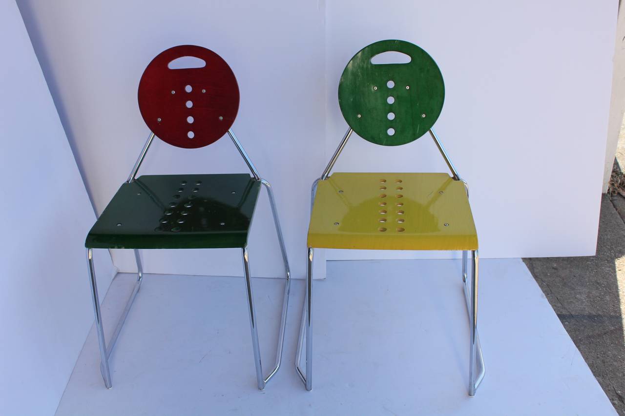 Memphis style 1980s Charlie chairs designed by Carlo Bimbi and Milo Gioacchini for Segis. Chrome based and wood seat and back.