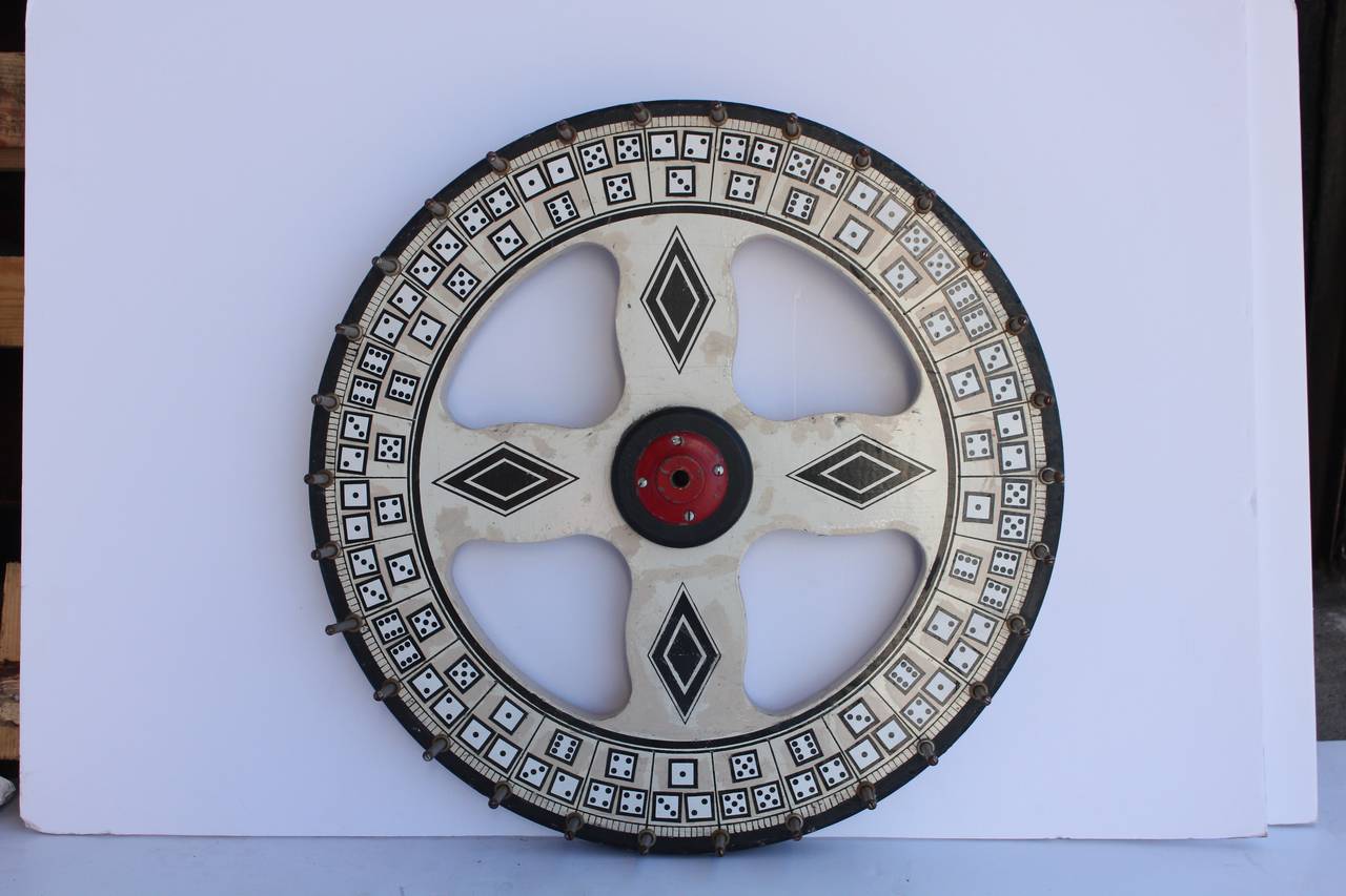 1930s hand-painted wood game wheel by Evans Co., Chicago.