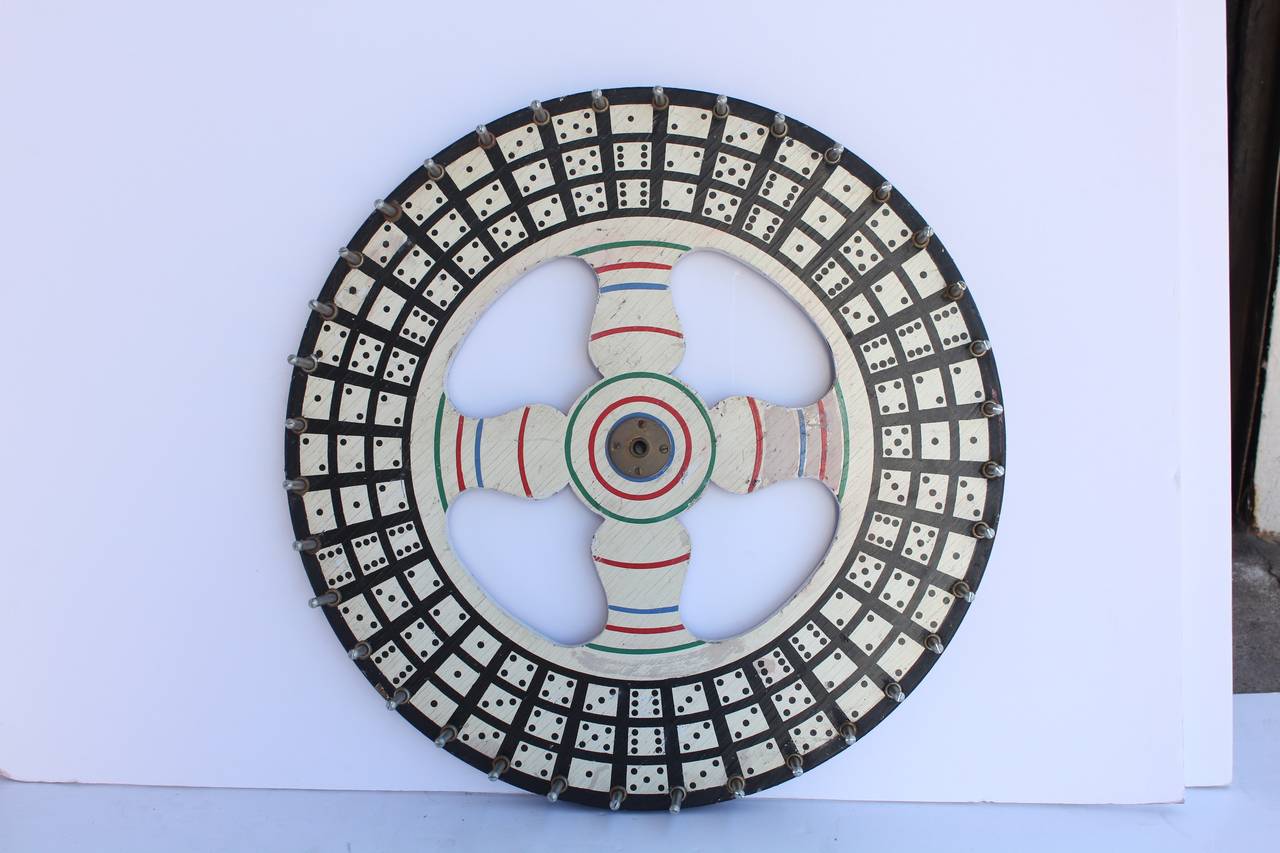 1930's hand painted wood black dice game wheel.