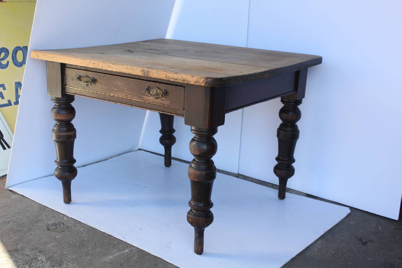 Beautiful antique turned leg table with a drawer. Original hardware.