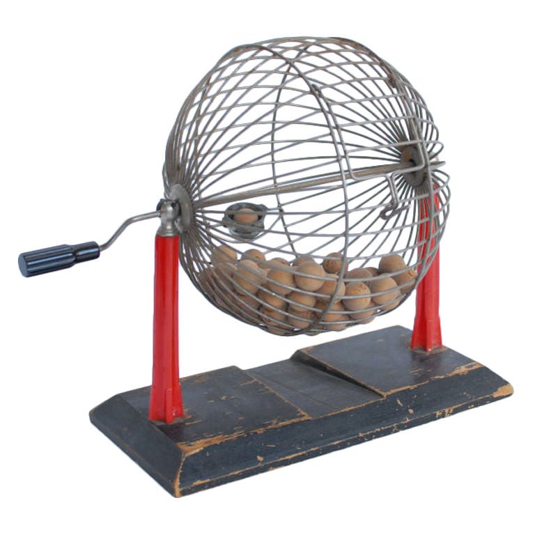 Vintage bingo cage with bakelite red stand and an handle For Sale