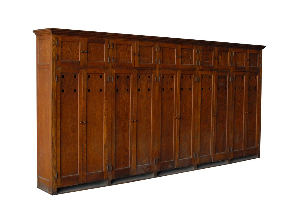 Very long 1900's American school wooden locker unit