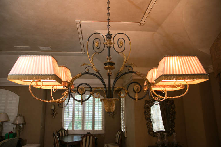 Exceptional 19th century French iron billiard chandelier restored, wired and refinished by famed restorer and lighting expert Paul Ferrante.

Acanthus and scrolls abound on this gorgeous French light, which is

completed with four new custom
