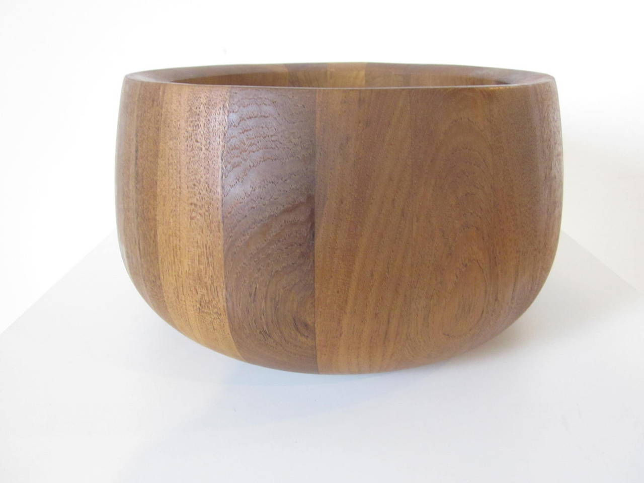 A teakwood salad bowl made by Dansk and designed by Jens Quistgaard great for a center piece or making that yummy salad . Manufactured in the manner of Danish wood wood working .