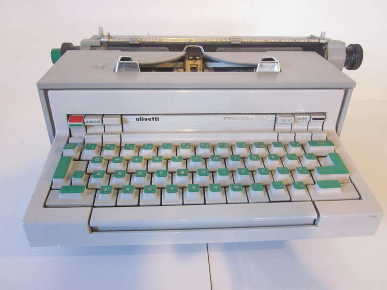A Olivetti praxis 48 electronic typewriter designed by Sottsass, in excellent working order and includes the power cord, booklet, registration and guarantee forms. This was state of the art during the 1960's and forward thinking in industrial
