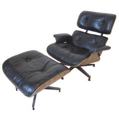 Eames Rosewood Lounge Chair and Ottoman by Herman Miller