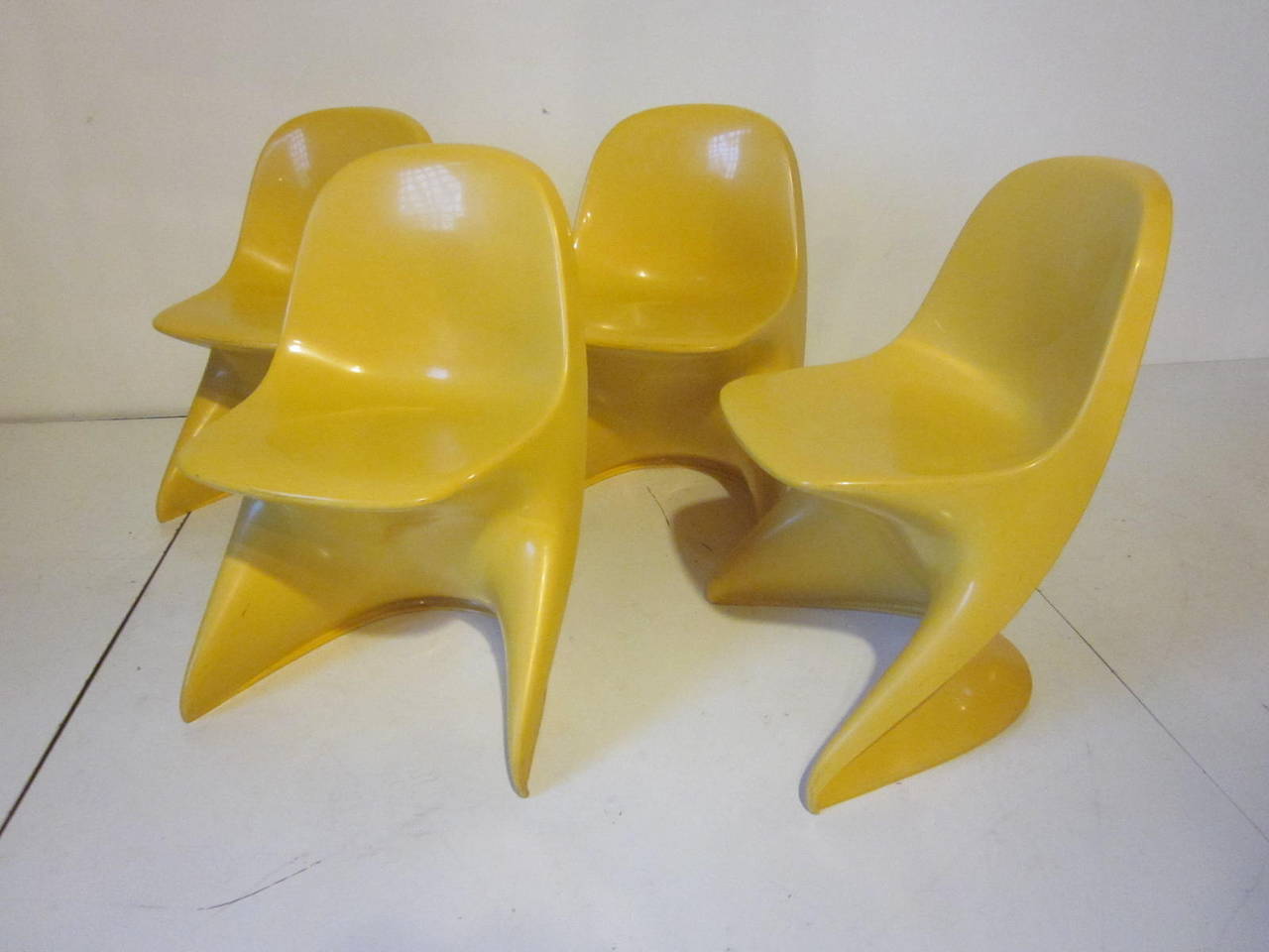 Casalino one bright yellow ABS plastic molded children's chairs that are stackable and cleanable. Makes the perfect modern addition to the kids play area or bedroom. Only two available .