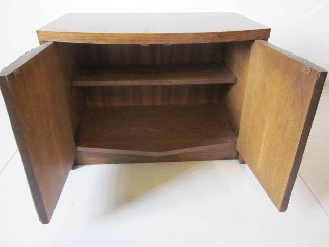 A sculptural nightstand/ side table in the brutalist style of Paul Evans with two doors and a internal shelve.