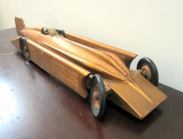 Keene, NH, manufactured in 1930, Kingsbury Company’s Golden Arrow Racer; an accurately depicted and scaled pressed steel model of the famous, WORLD'S FASTEST CAR. Incredible futuristic design, with mammoth water cooler side tanks, wedged nose,