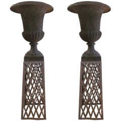 Pair of "Rusty" Resin Garden Urns on Metal lattice Pedestals 