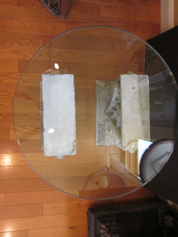 Cement Glass top coffee table with antique cement pedestals base For Sale