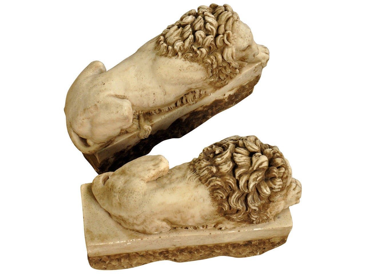 A Pair Of Hand Carved Marble Recumbant Lions From Italy On Rectangular Plinths In Good Condition In Atlanta, GA