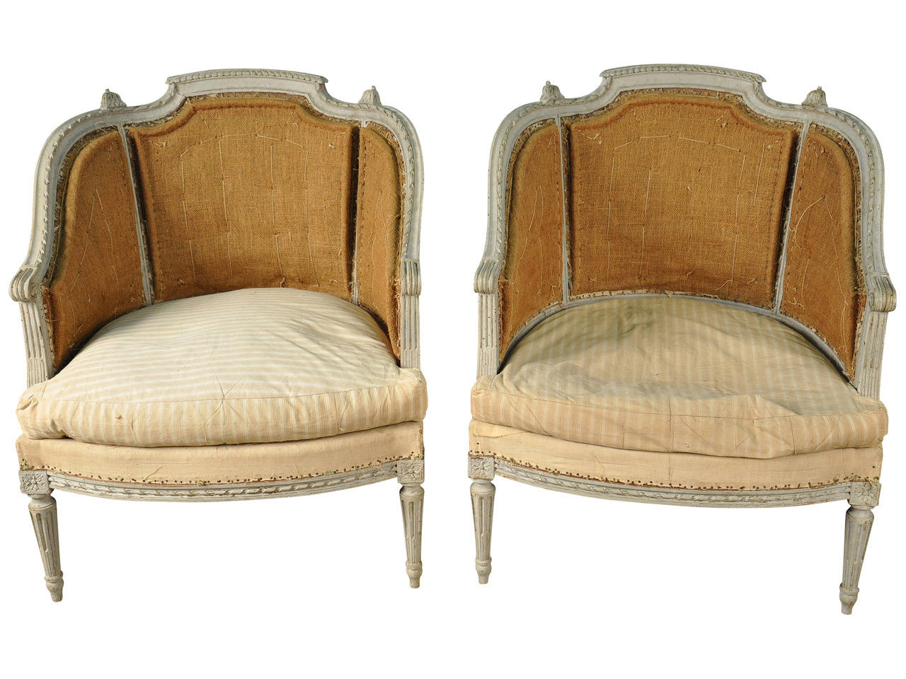 A fabulous pair of French 19th century Louis XVI style Marquises Bergeres in painted wood.  Soundly constructed with elegant carving detail.  The painted finish of this lovely pair of armchairs is in a classical soft French grey.