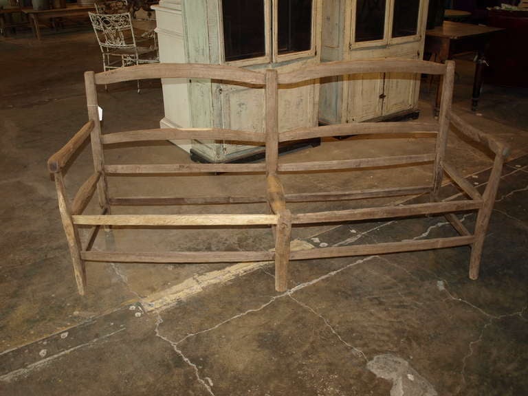 French antique late 19th century country style banquette frame in washed oak. This piece has a beautiful finish and great scale. This banquette would look great with an upholstered or rush seat. The design possibilities are endless!

Keywords: