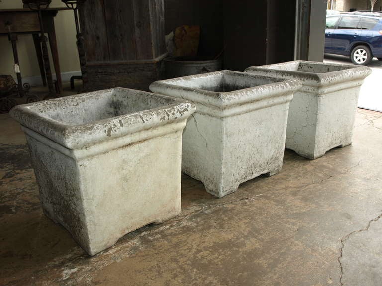 Mid 20th century concrete planters. Three planters are available. Price listed, $450.00 per piece.