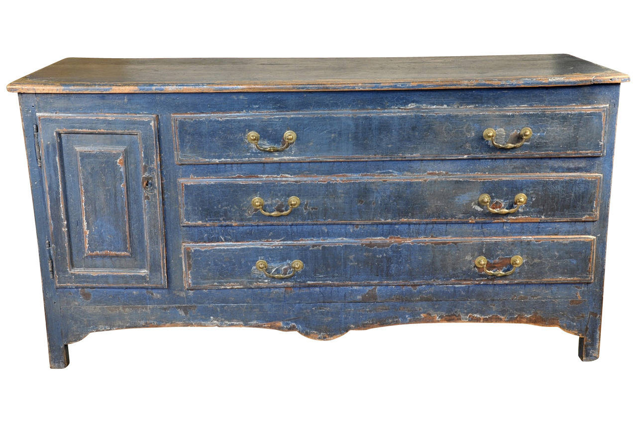 An exceptional 18th century painted commode from the Catalan region in Spain.  Originally, an ecclesiastical piece with an interesting configuration of three drawers ans one door.