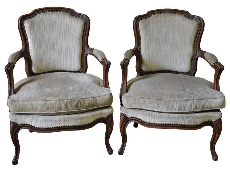 Pair of French antique late 19th century Louis XV style armchairs in walnut